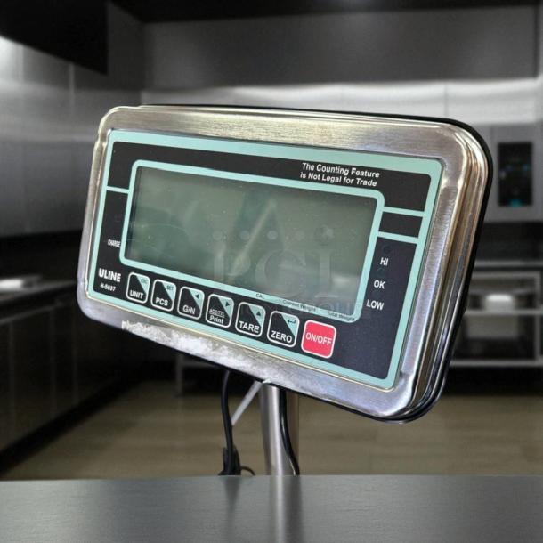 Uline digital platform scale, model H-5837, excellent condition, 120V, fully tested, clear display, control buttons visible.