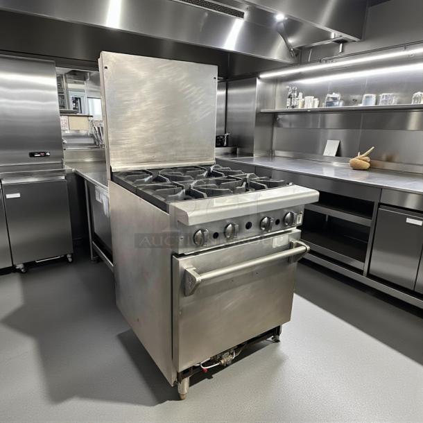 American Range AR-4 24" natural gas 4-burner range with space-saver oven, 155,000 BTU, excellent condition, stainless steel.