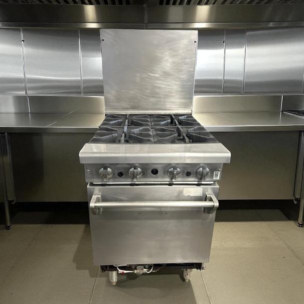 American Range AR-4 24" 4-burner natural gas range with space-saver oven, 155,000 BTU, excellent condition, tested working.