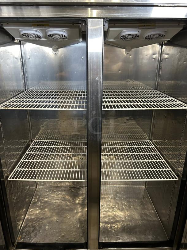 Everest ESF2 Stainless Steel Reach-In Freezer, 49 5/8", 48 cu. ft, 2 Solid Doors, Excellent Condition, Top Mount Fans.
