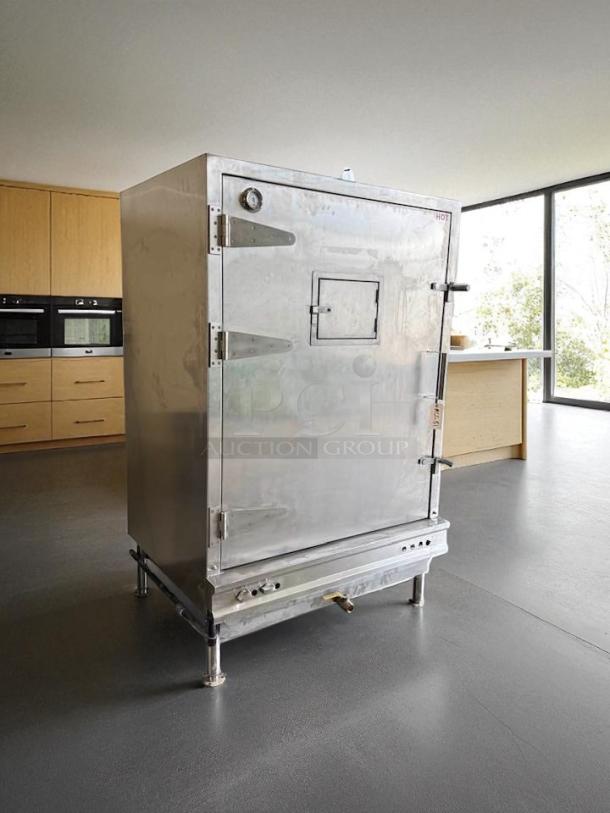 Stainless steel Chinese BBQ oven by China Pacific Co., Inc., model EQ-36L. Features a left hinge and visible gauge. Tested and working.