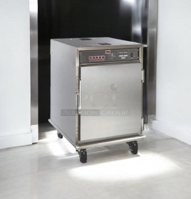 Henny Penny HC-903 CDT heated holding cabinet, excellent condition, 208-240V AC, silver finish, on wheels, fully tested.