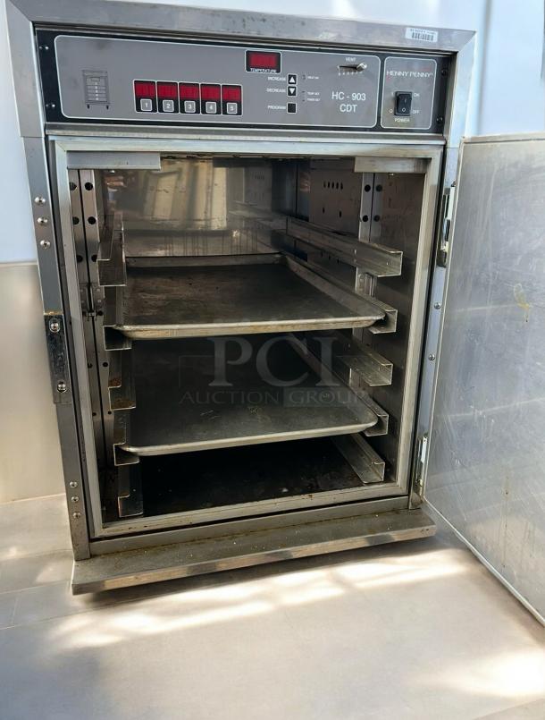Henny Penny HC-903 CDT heated holding cabinet in excellent condition, 208-240V AC, fully tested, visible controls, open door.