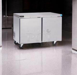 Stainless steel 2-door undercounter refrigerator, excellent condition, fully tested, on wheels, model: Standard Undercounter Refrigerator.