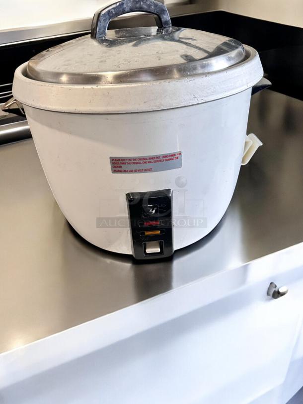 Thunder Group SEJ-50000 commercial rice cooker, 30 cup capacity, in excellent condition with visible instruction label.