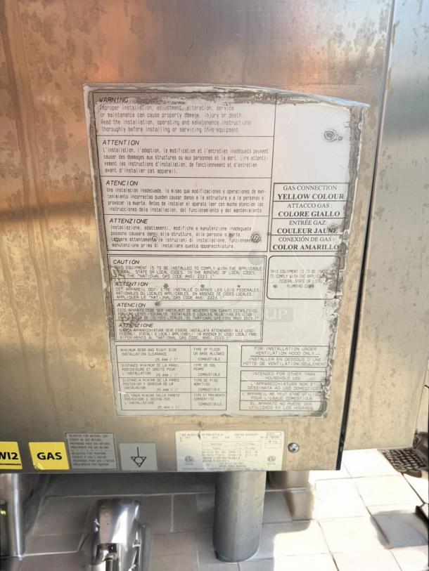 Electrolux Air-O-Steam Combi Oven, gas-powered, 120V ignition, fully tested, excellent condition, visible safety labels.