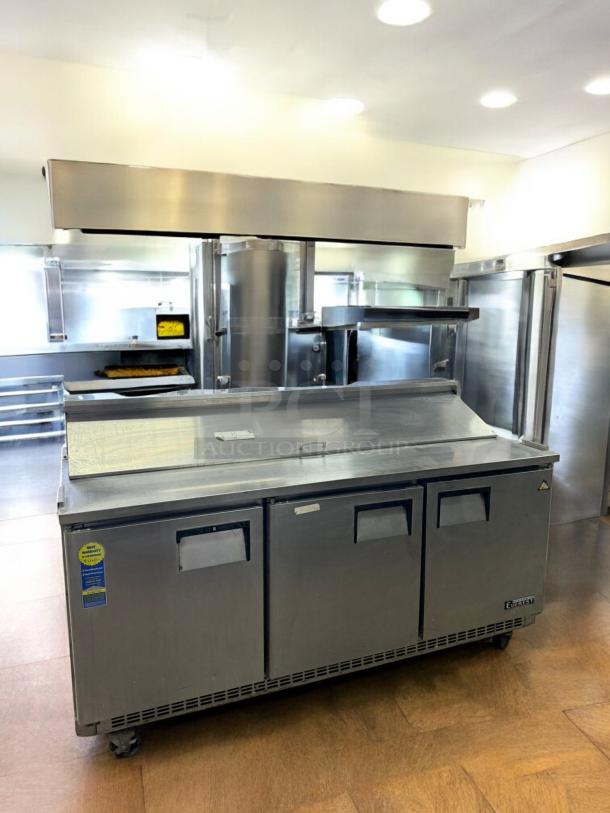 Everest EPBNR3 3-door refrigerated sandwich prep table in excellent condition, 115V, fully tested and working.