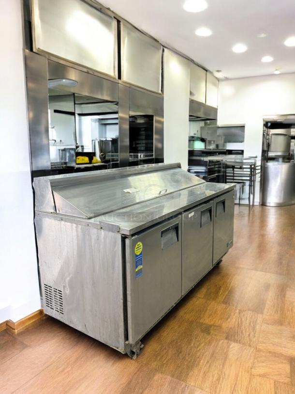 Everest EPBNR3 3-door refrigerated sandwich prep table in excellent condition, fully tested, 115V, stainless steel.