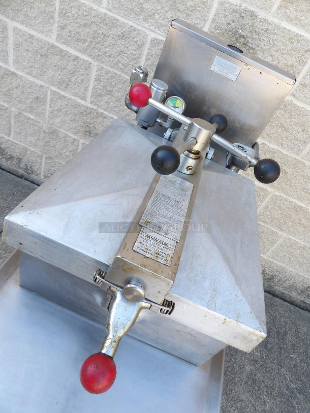 Henny Penny 600 stainless steel pressure fryer, excellent condition, natural gas-powered, on commercial casters, 80,000 BTU.