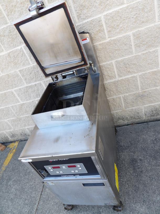 Henny Penny 600 Computron 1000 electric pressure fryer in excellent condition; stainless steel; on commercial casters.