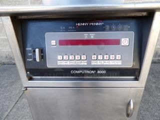 Henny Penny Computron 8000 pressure fryer, excellent condition, stainless steel, natural gas, 80,000 BTU, commercial casters.