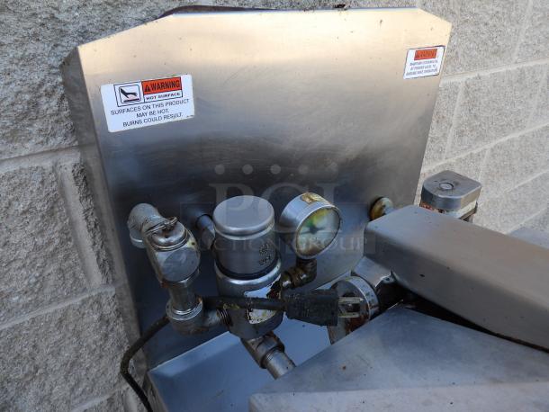 Henny Penny Computron 8000 pressure fryer in excellent condition, stainless steel, Model 600, 80,000 BTU, commercial casters, warning labels visible.