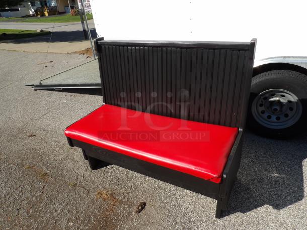 Single booth with solid wood construction, removable red cushion, and paintable finish. Excellent condition.