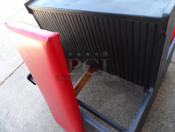 Double booth with red removable cushions, solid wood construction, paintable, includes removable dividers, excellent condition.