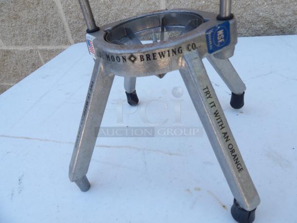 Nemco fruit/vegetable wedge cutter, metal, 4-section, used, "Blue Moon Brewing Co." and "Try it with an orange" markings.