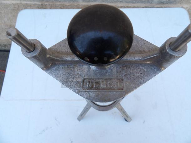 Nemco 4 Section Fruit/Vegetable Wedge Cutter, stainless steel, black handle, used condition, visible Nemco branding.