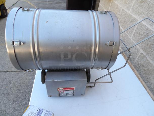 Like new Henny Penny BM-110 chicken breading machine, stainless steel, 120V, powers on, excellent condition, visible labels.