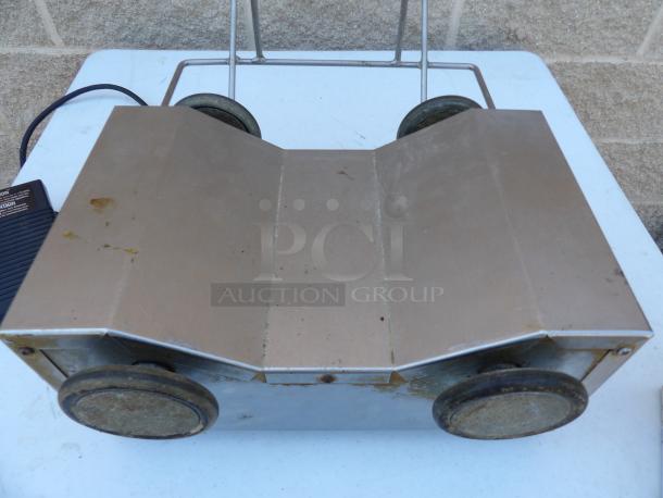 Henny Penny BM-110 chicken breading machine, stainless steel, like new condition, 120V, visible wear on base.