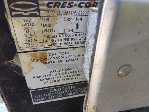 Crescor Infra-Red Warmer, Model 488-U-4, 1500 Watts. Label shows usage and installation cautions. Good condition.