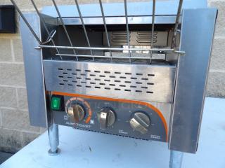 AVA TT-300-240 commercial stainless steel conveyor toaster on legs, featuring control knobs and power switch.