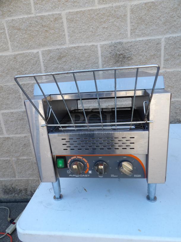AVA TT-300-240 commercial toaster, stainless steel, countertop model with legs, 240V, visible controls, labeled “AVA TOAST.”