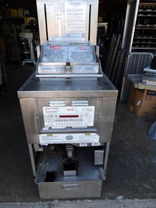 Henny Penny PFG-690 stainless steel commercial pressure fryer with filtration system, on casters, 100,000 BTU, natural gas-powered.