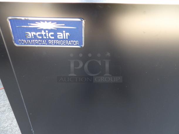 New 2023 Arctic Air AUB36RZ 37" black horizontal bottle cooler, pristine condition, features commercial refrigerator label.