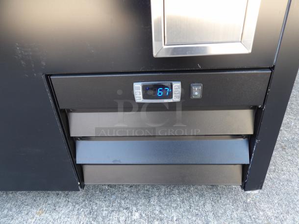 "New 2023 Arctic Air AUB36R 37-inch black horizontal bottle cooler with digital temperature display, model AUB36RZ."