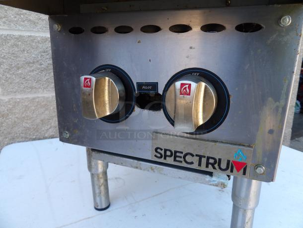 Spectrum NGH-2 stainless steel 2-burner gas range, commercial countertop model, used condition, visible branding and control knobs.