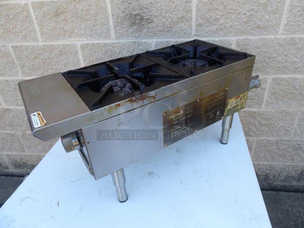Spectrum NGH-2 stainless steel 2-burner gas countertop range, 12x27x15. Features visible labels, some wear and rust.