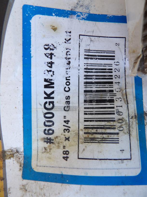 Regency 48" stainless steel gas connector hose, 3/4" diameter, labeled #600GKM3448, slightly worn with barcode.