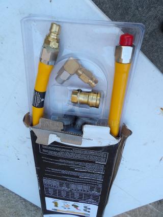 Regency 48" yellow steel gas connector hose, with fittings and kit, 3/4" NPT, new condition, in original packaging.
