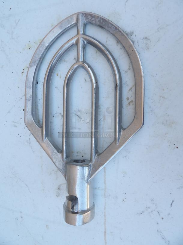 New 20Qt mixing paddle, metal construction, in excellent condition, featuring a robust stainless steel design.