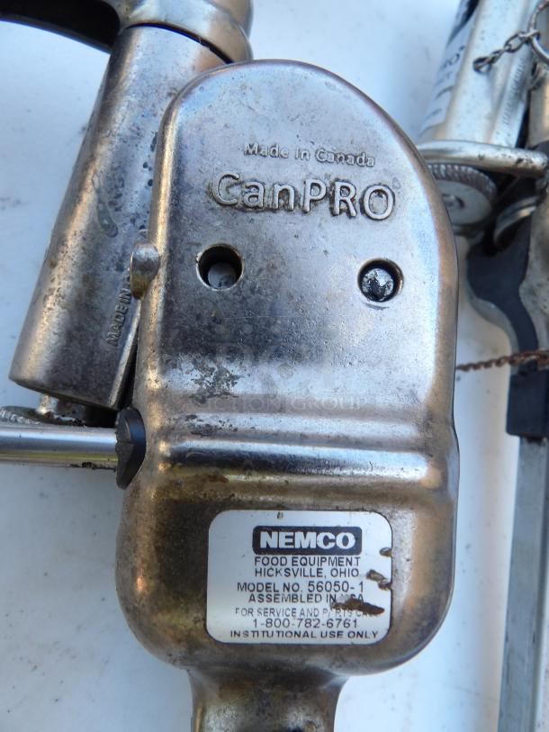 Nemco 56050-1 CanPRO manual can opener, heavy duty, side cut, permanent mount, visible wear, "Made in Canada" marking.