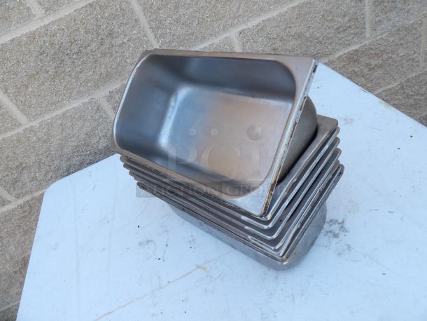 1/3 Size 4" Deep Anti-Jam Stainless Steel Steam Table Pan, 24 Gauge, stackable, used condition.