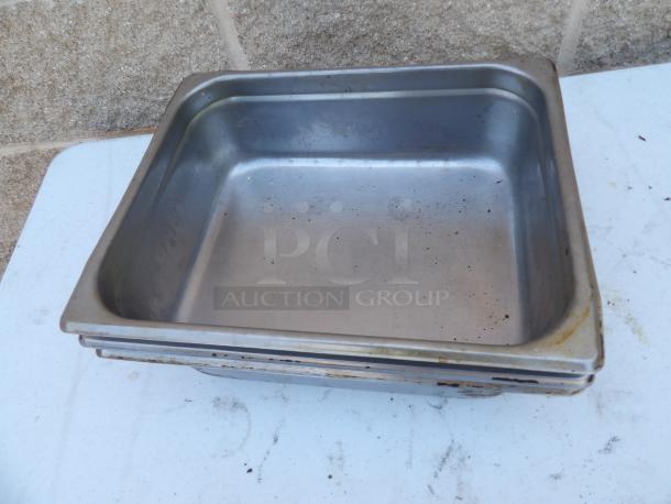 1/2 Size 2.5" deep anti-jam stainless steel steam table pan, 24 gauge, fair condition with visible wear.