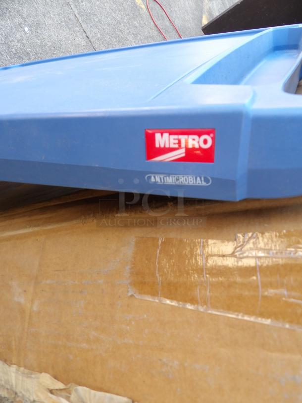 Metro myCart MY2636-35BU blue antimicrobial utility cart, three shelves, Metro logo, visible label, 28" x 40".