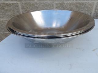 8 Qt. heavy weight stainless steel mixing bowl, 14-inch round x 4.5-inch deep, shiny finish, good condition.