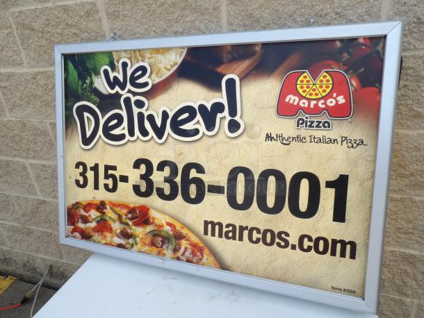 Two-sided lighted sign cabinet with a removable frame, displaying a business advertisement for pizza delivery. Powers on and works great.