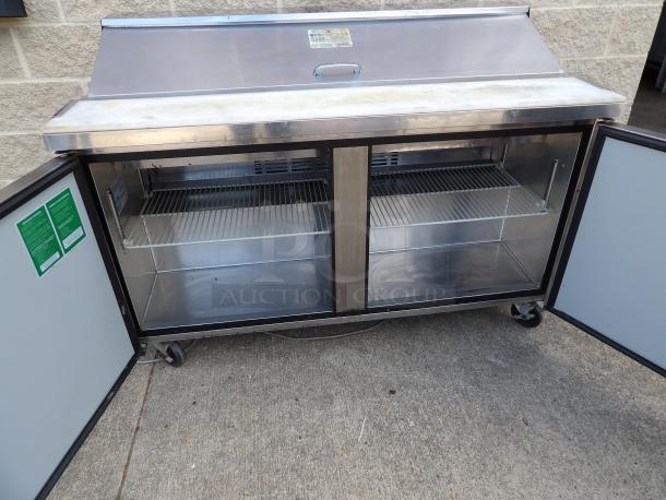 Turbo Air MST-60 commercial stainless steel 2-door prep refrigerator with poly coated wire racks, on casters. 110-120V, 1 phase.