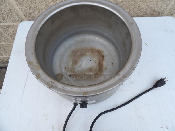 Adcraft 11 Quart Round Food Warmer, Model FW-1200WR, shows signs of use, visible wear inside, includes power cord.