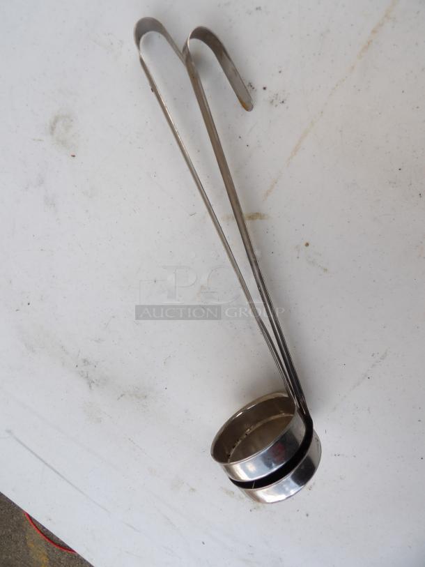 Two stainless steel 4-ounce ladles with hooked handles, shown on a white surface.