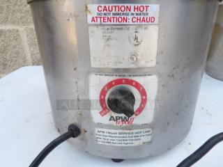APW Wyott food warmer with dial control, stainless steel, labels warn "Caution Hot." Powers on and heats efficiently.