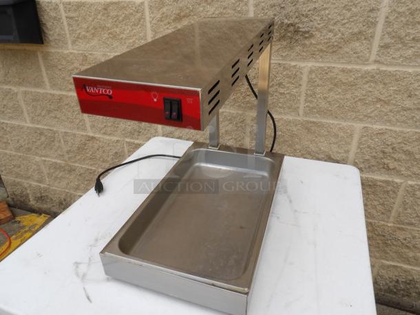 Avantco Fry Warmer/Dump Station YC-001, 120V, stainless steel, powers on, features control switches, good condition.