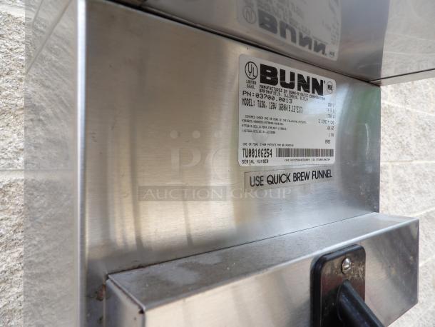 BUNN Tea Brewer Model TU3Q, stainless steel, with quick brew funnel tag. Powers on and heats, uses 120 volts.