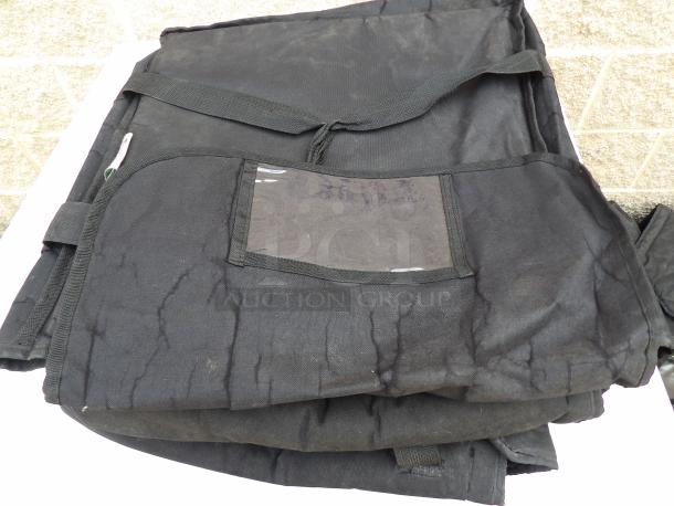 Black insulated pizza delivery bag, single compartment, fabric material, showing signs of wear.