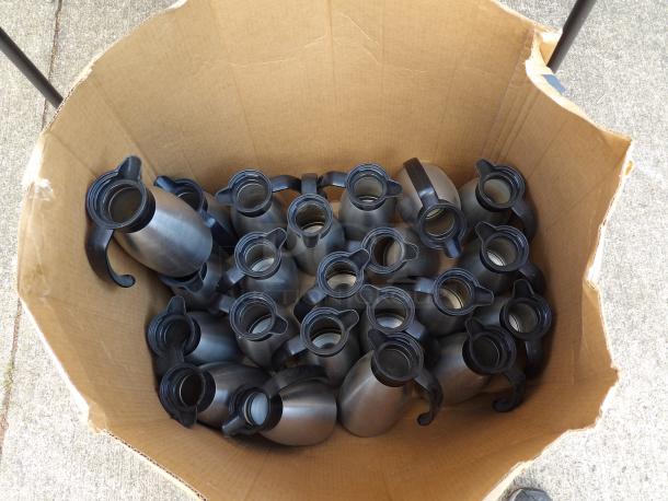Cardboard box filled with Service Ideas stainless steel insulated coffee carafes, 33.8 oz., black lids, used condition.