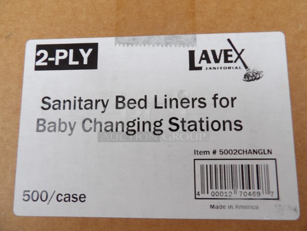 Lavex 2-Ply Baby Changing Table Liners, 500 per case. Label indicates "Sanitary Bed Liners for Baby Changing Stations", item #5002CHANGLN.