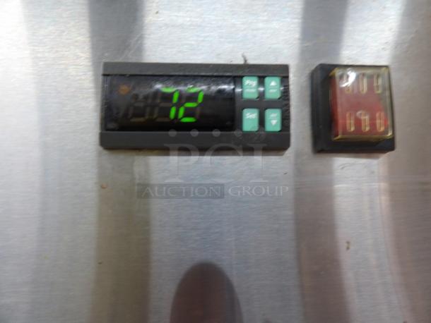 Digital display and control panel on Avantco 178A19FHC stainless steel commercial single door reach-in cooler.