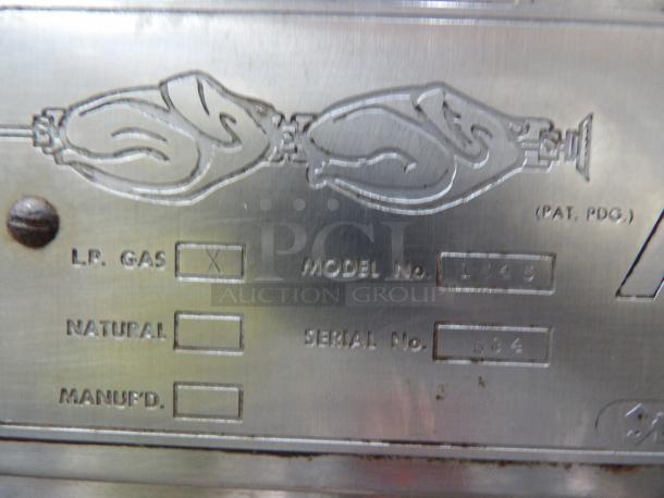 Late Model Rotisserie Gas Model 1545 label, showing LP gas checkbox marked, model number 1545, and serial number 594.